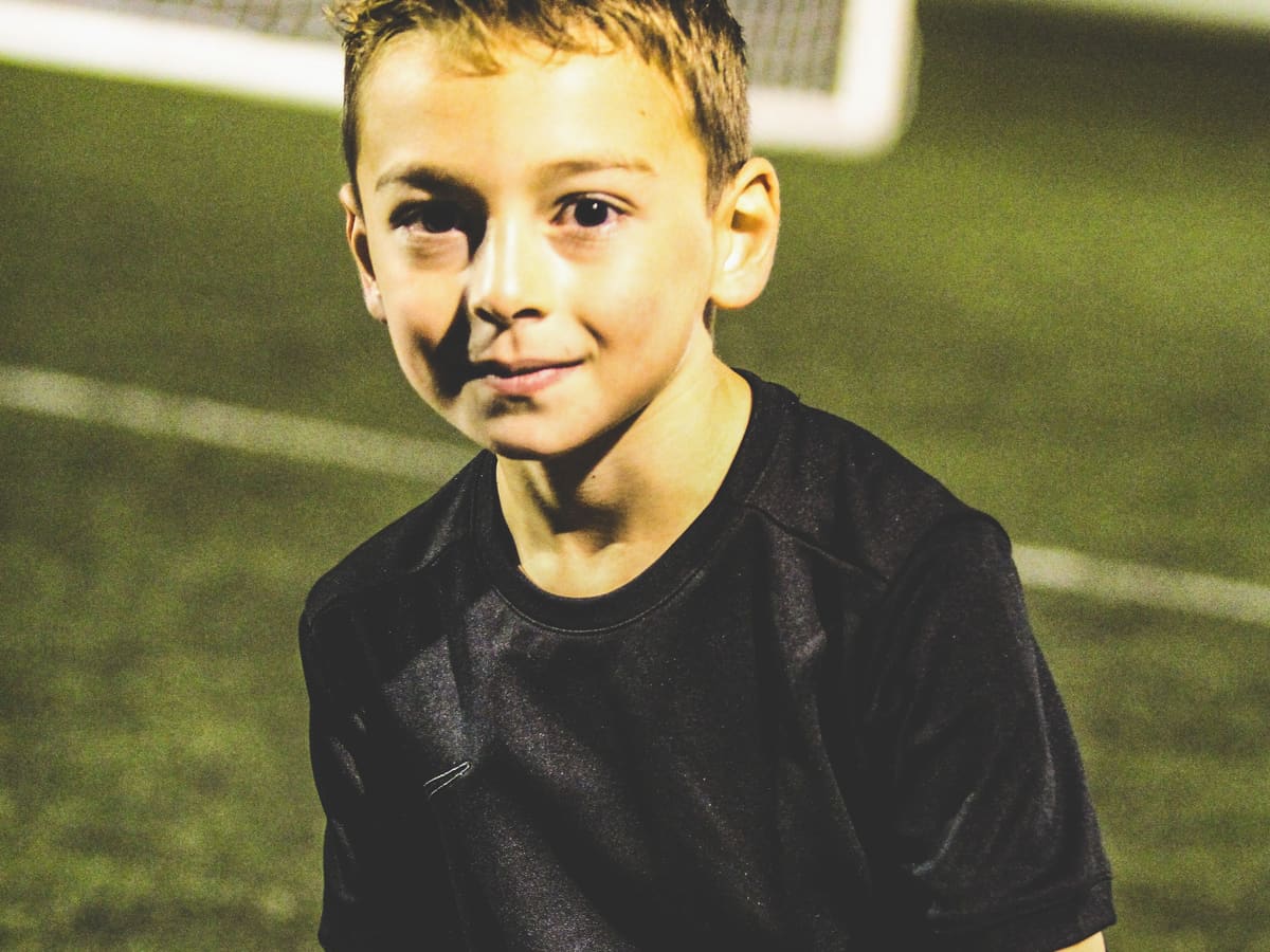 Young Fundamental FC players together during a floodlit session